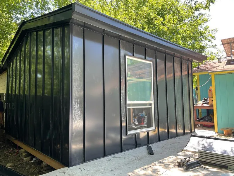 Black standing seam metal wall panels for Metal Roof Installation in Tarrytown