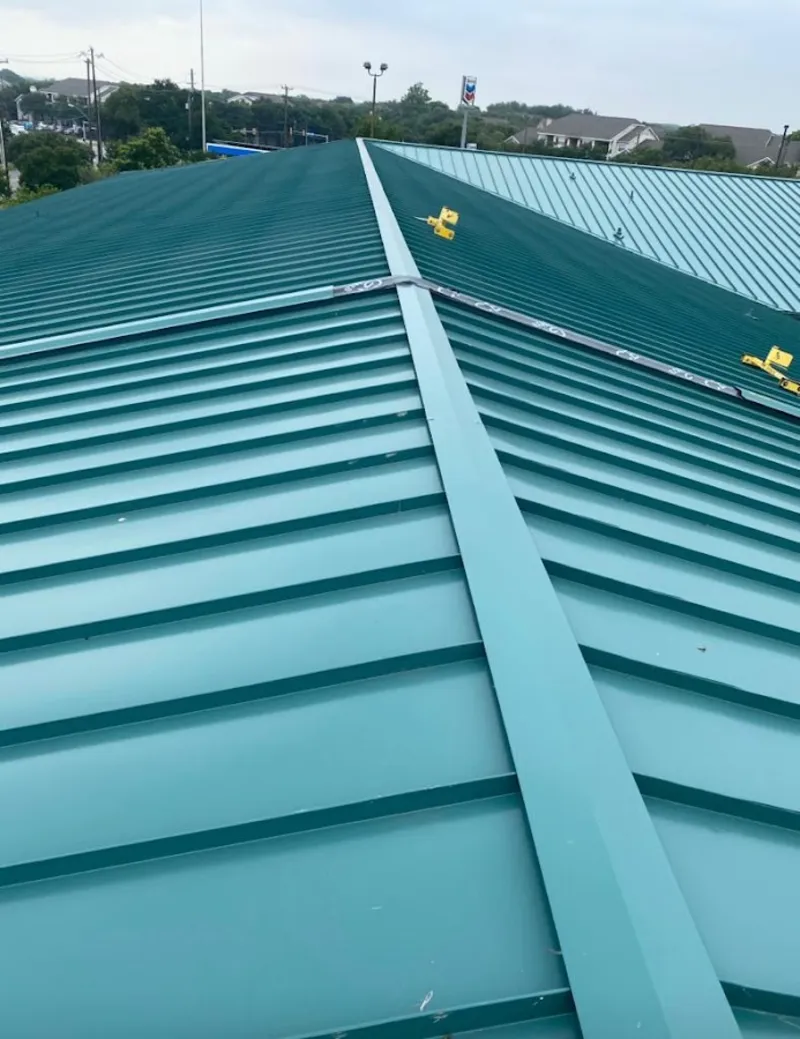 Green commercial metal roof ridge and valley for Metal Roof Repair in Tarrytown